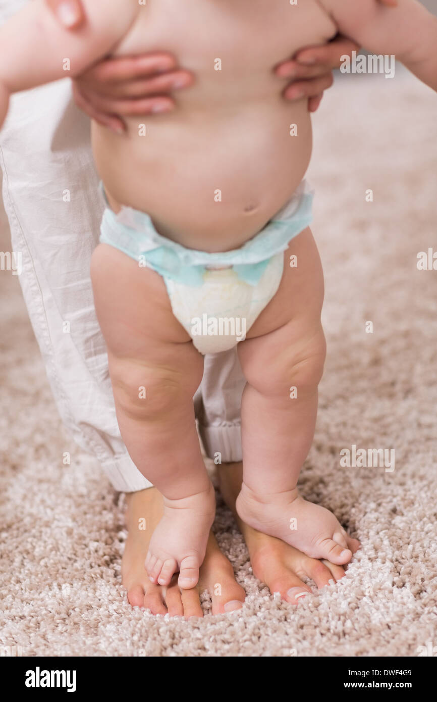 Teaching to walk hi-res stock photography and images - Alamy