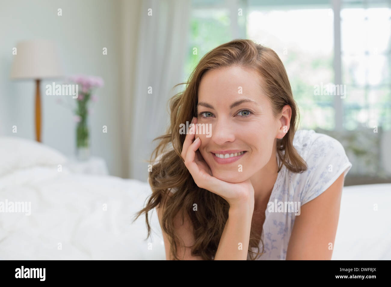Close-up portrait of a beautiful smiling young woman Stock Photo - Alamy