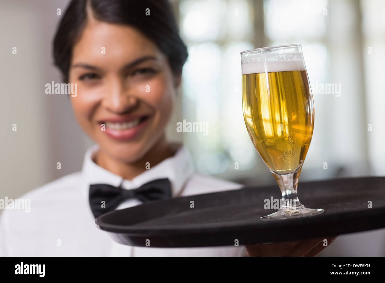 Waitress beer tray hi-res stock photography and images - Alamy