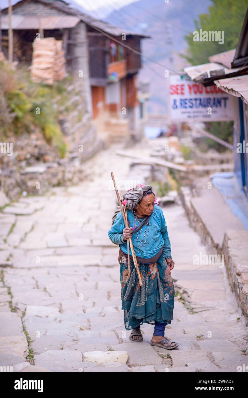An old smiling nepali woman in streets of Kathmandu Stock Photo
