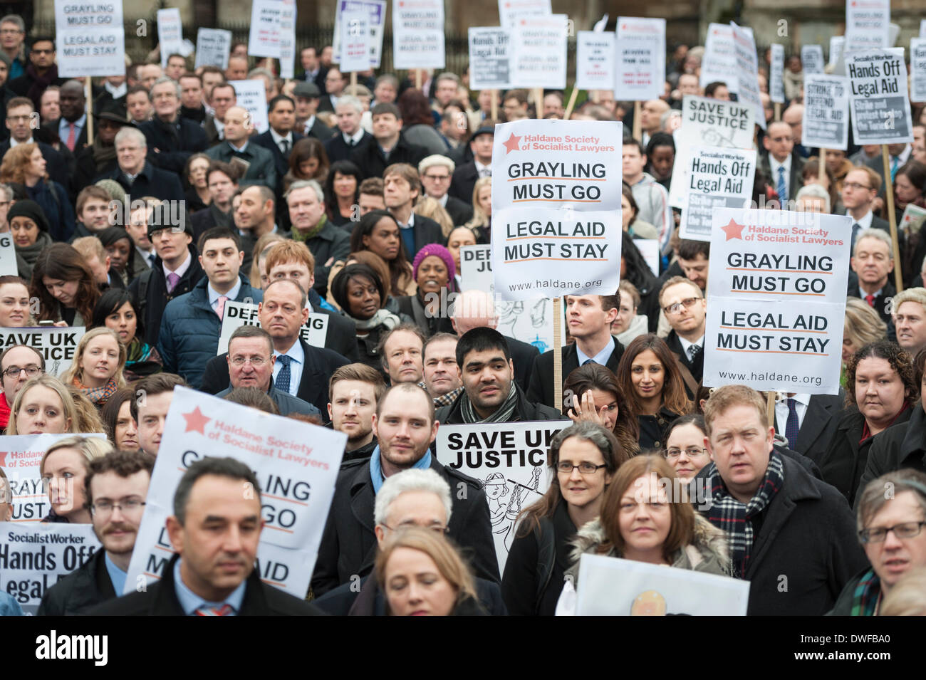 Old Palace Yard, London, UK. 7th March 2014. Legal demonstrators protest outside parliament in London, where barristers and solicitors assembled and then marched on the Ministry of Justice to hand in a modern copy of the Magna Carta. Credit:  Lee Thomas/Alamy Live News Stock Photo