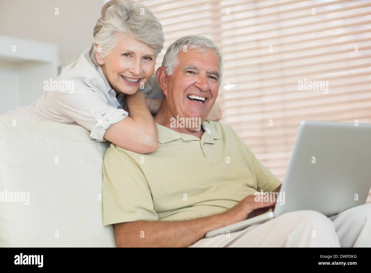 Happy senior couple using the laptop together Stock Photo