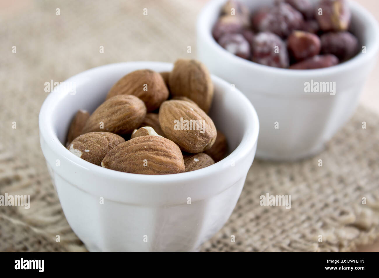 Almonds kernel in bowl , close up photo Stock Photo