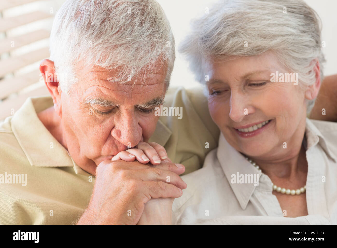 Senior couple holding hands Stock Photo