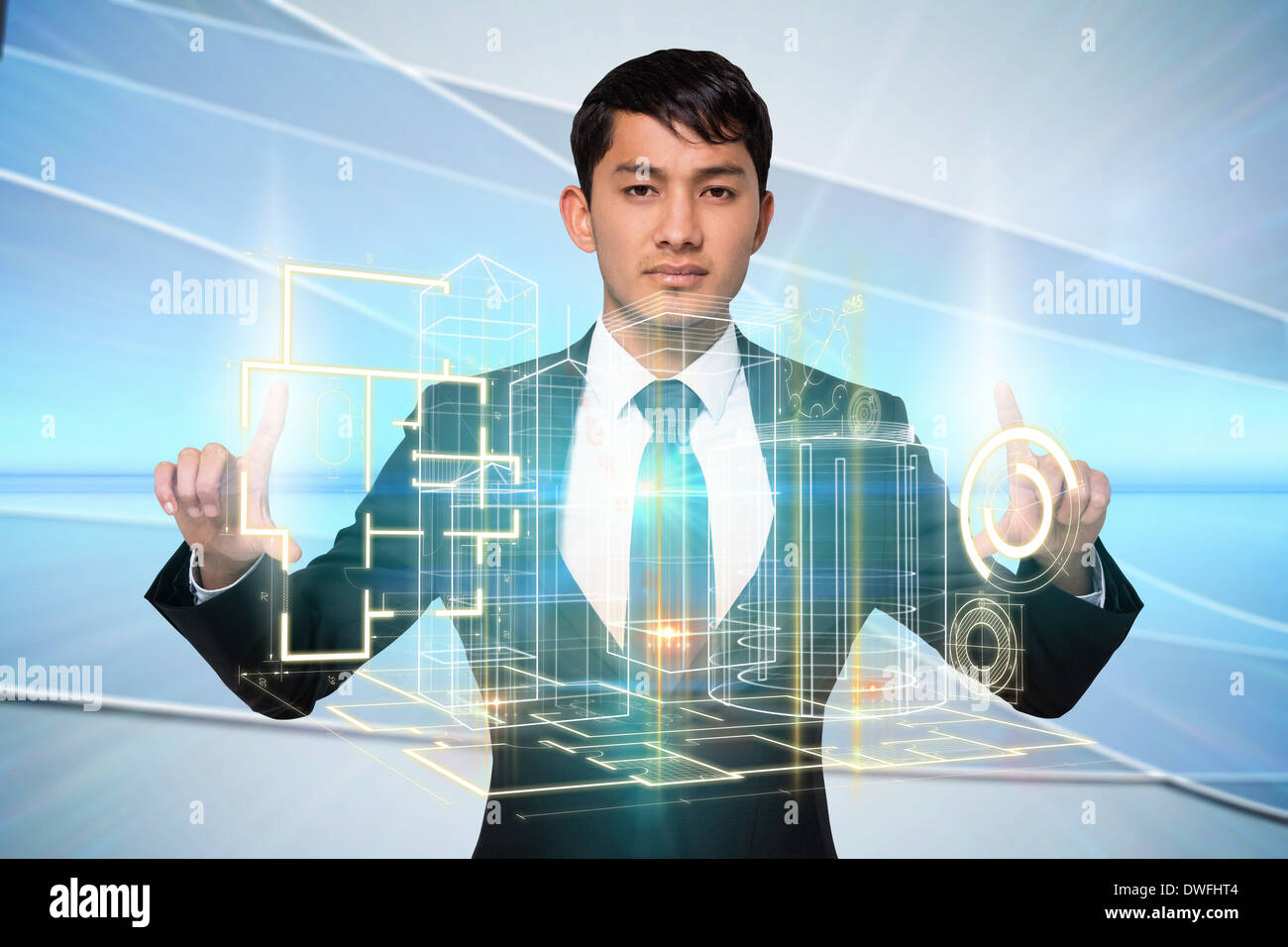 Serious businessman touching interface Stock Photo