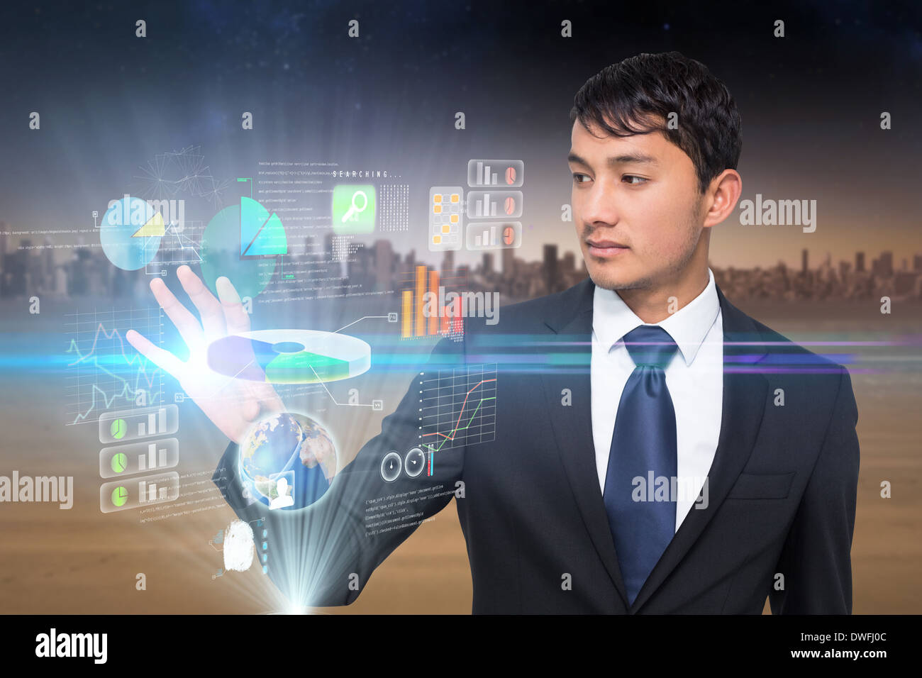 Asian businessman touching interface Stock Photo