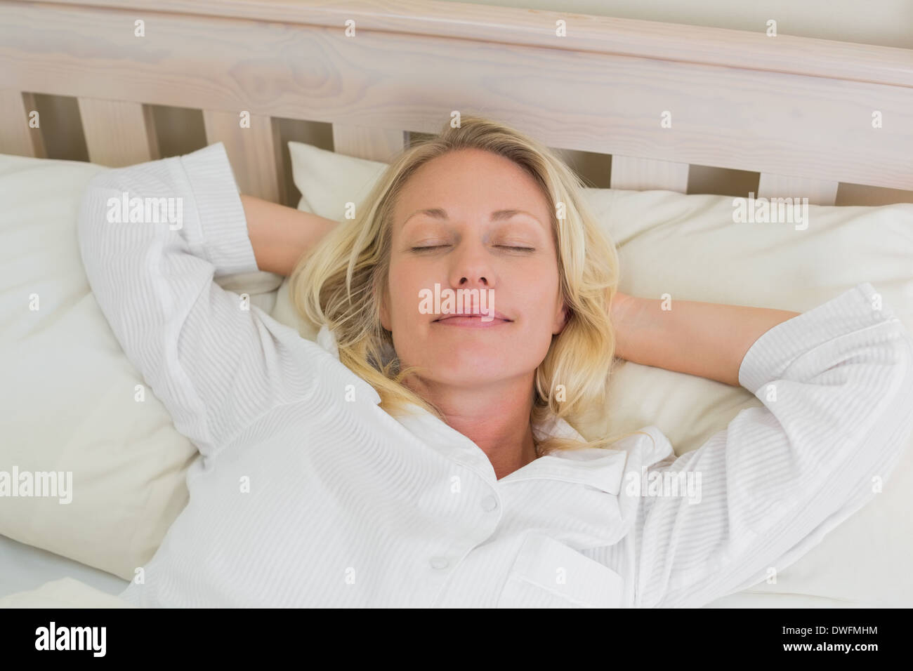 Woman sleeping in bed Stock Photo Alamy