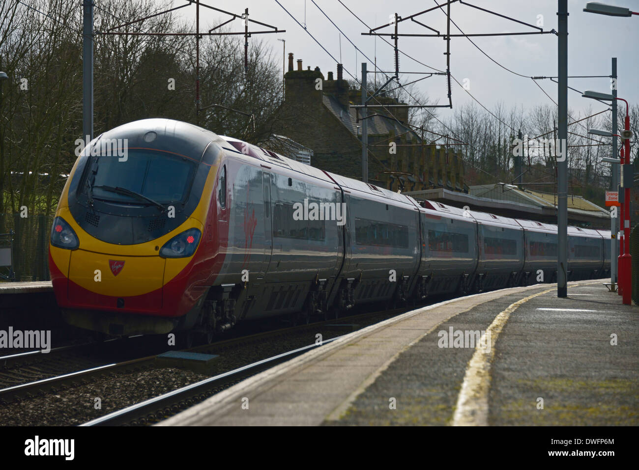 Virgin Pendolino Class 390 passenger train.Oxenholme Rail Station ...