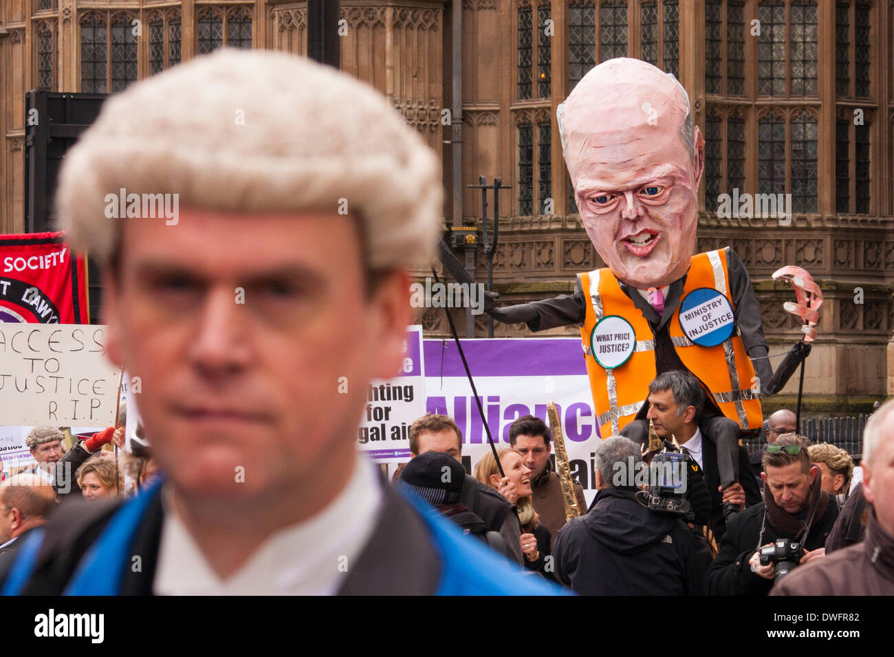 London March 7th 2014. Barristers and solicitors in London begin their march from Parliament to the Justice Ministry during their walk out in protest against further cuts of £215 million to the legal aid budget, and a reduction by a third of duty lawyers' contracts. Credit:  Paul Davey/Alamy Live News Stock Photo