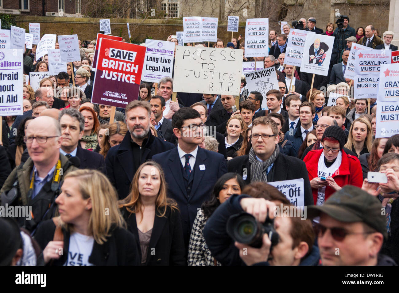 London March 7th 2014. Hundreds of barristers and solicitors in London attend a rally at Parliament during their walk out in protest against further cuts of £215 million to the legal aid budget, and a reduction by a third of duty lawyers' contracts. Credit:  Paul Davey/Alamy Live News Stock Photo