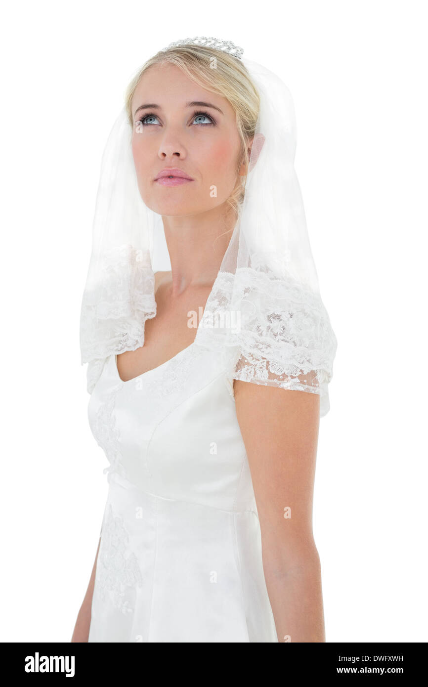 Bride looking up over white background Stock Photo