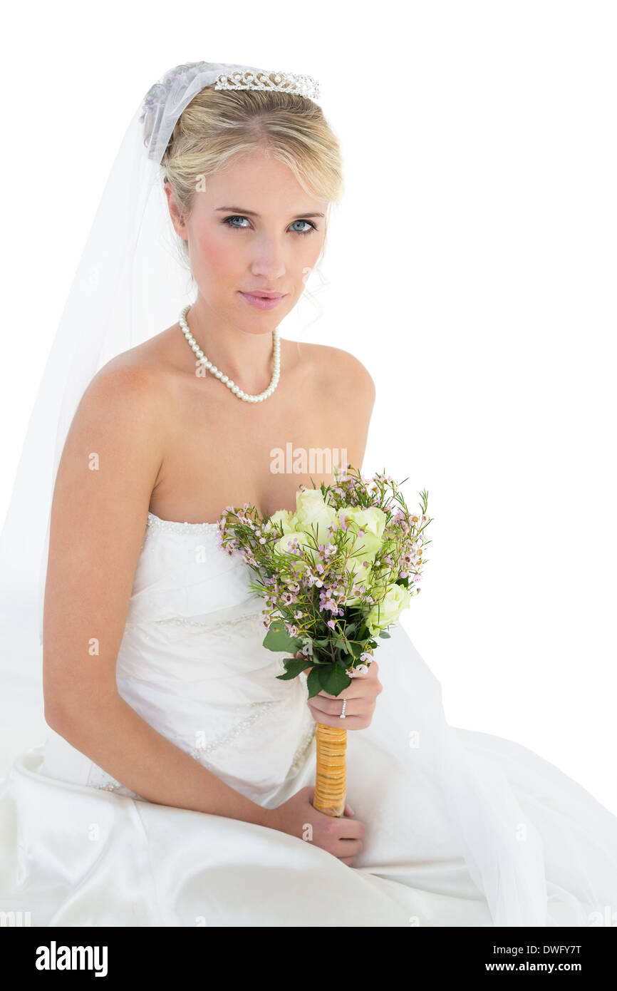 Portrait of bride holding flower bouquet Stock Photo - Alamy