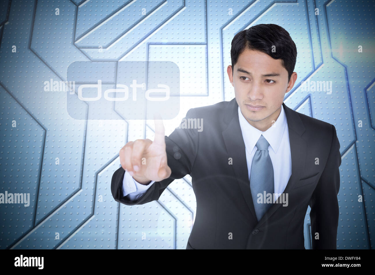 Data against circuit board on futuristic background Stock Photo