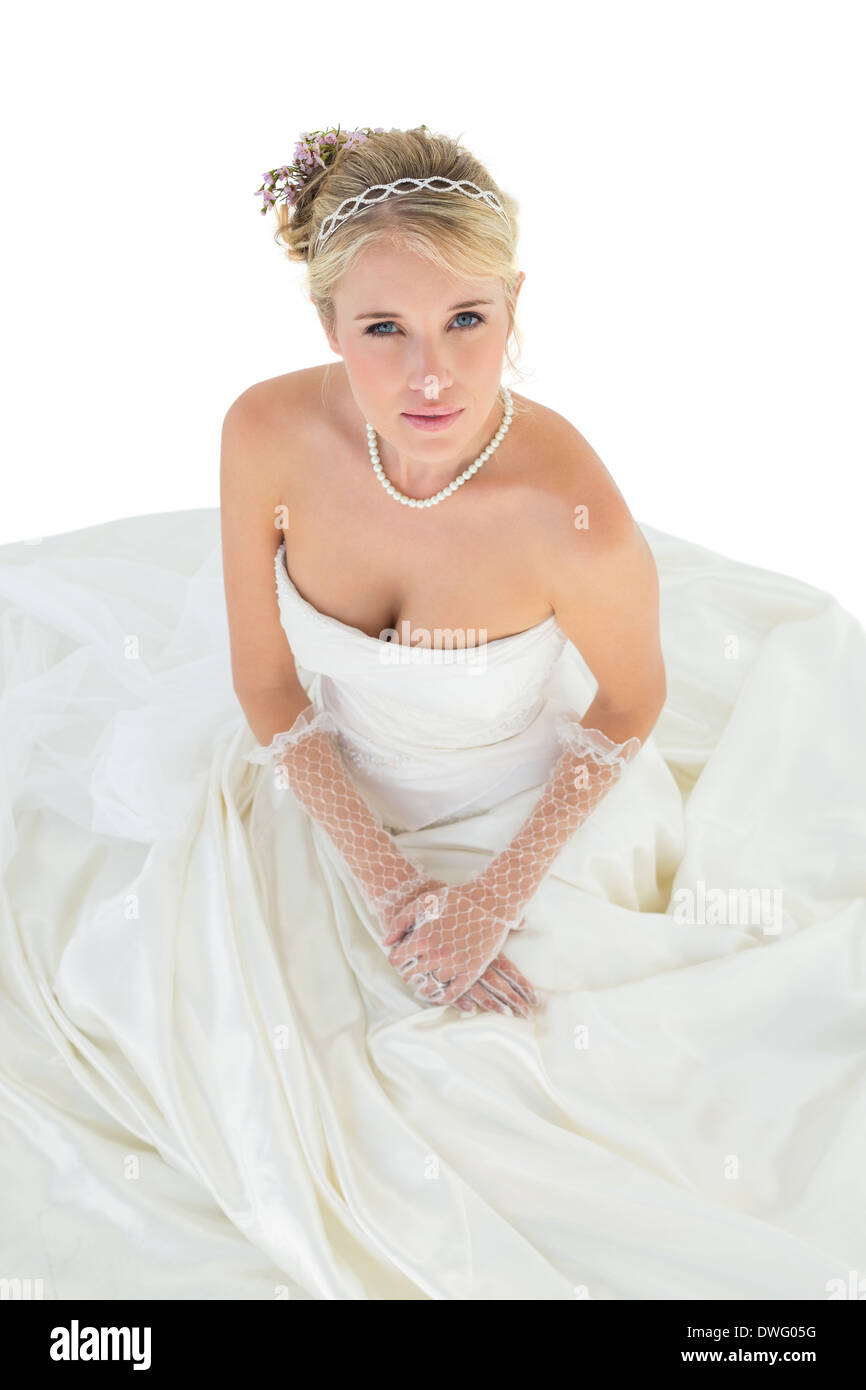 Elegant bride in wedding dress over white background Stock Photo - Alamy