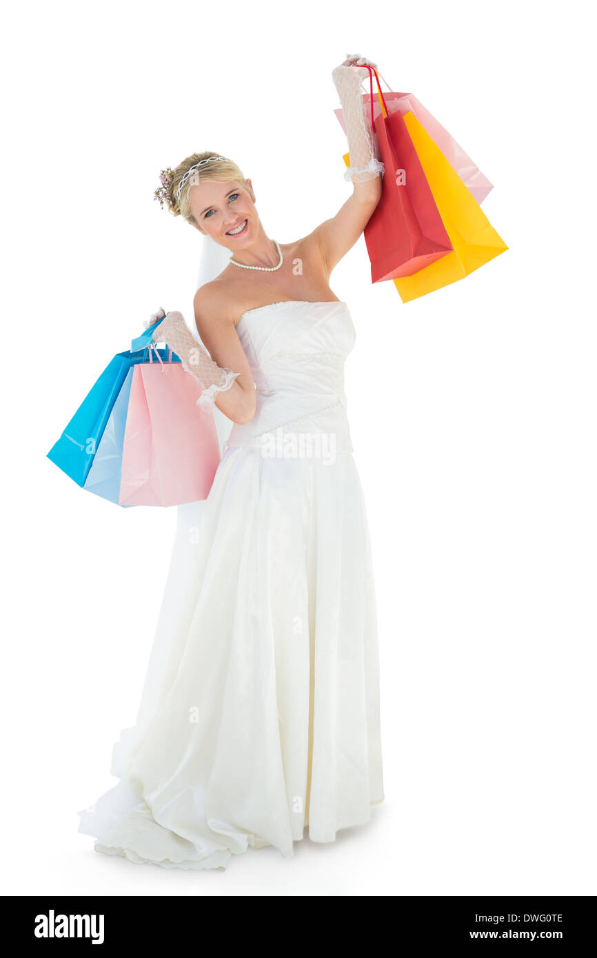 Bride carrying shopping bags over white background Stock Photo