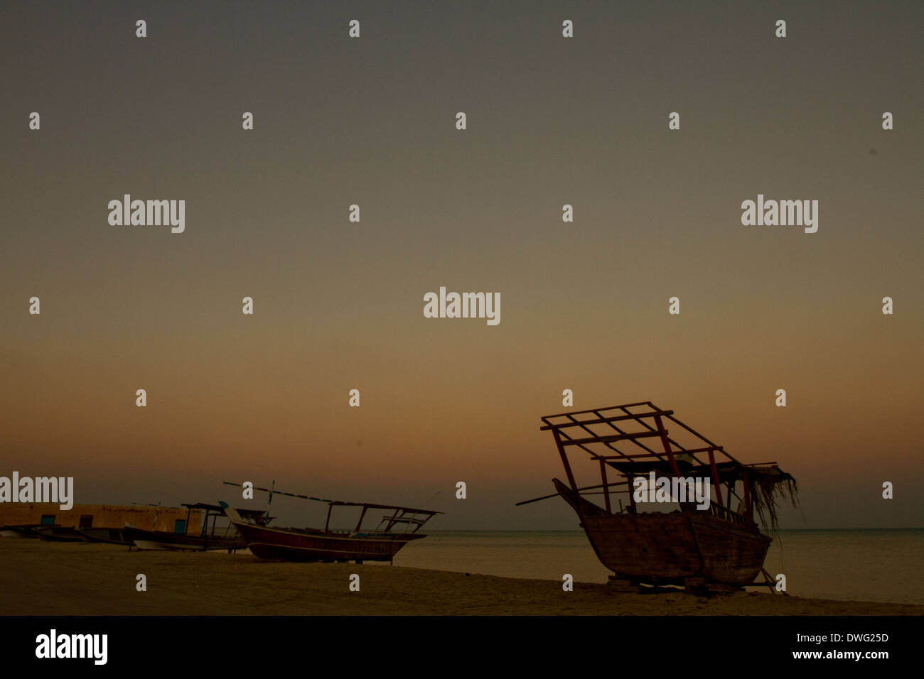 Beached traditional dhow boat in Al Wakra, Qatar Stock Photo