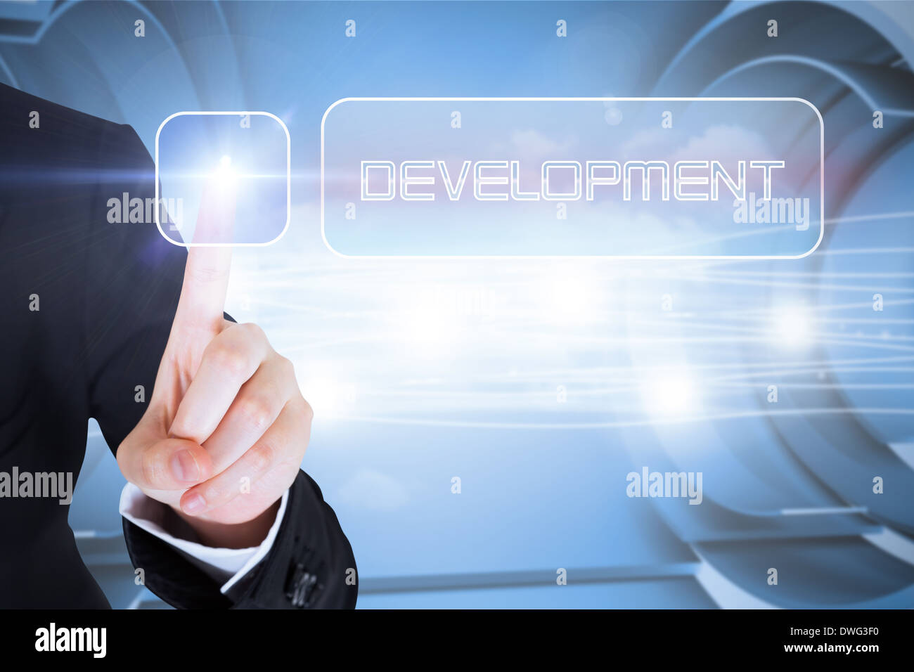 Businesswomans finger touching Development button Stock Photo - Alamy
