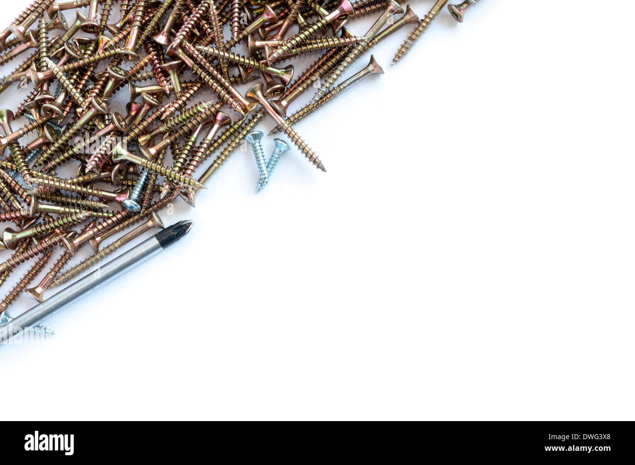 Set of screws and a screwdriver and glove over a white background with space for text Stock Photo