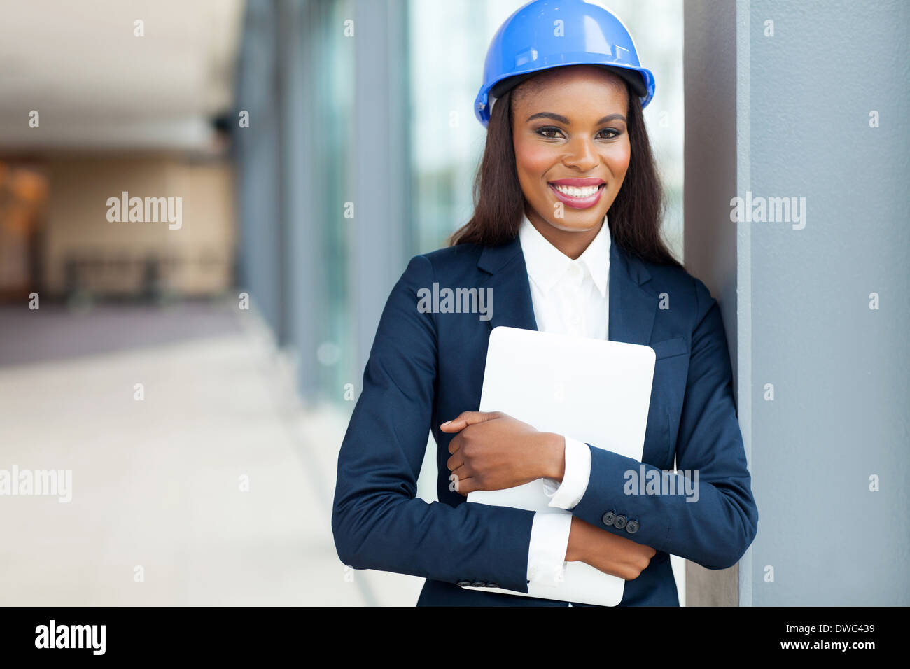 beautiful African construction engineer holding laptop computer Stock ...