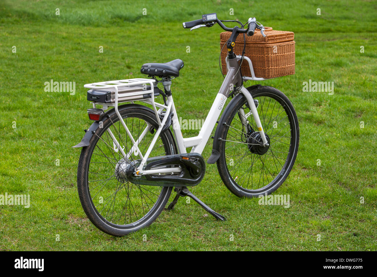 White pedelec / e-bike / electric bicycle in field Stock Photo