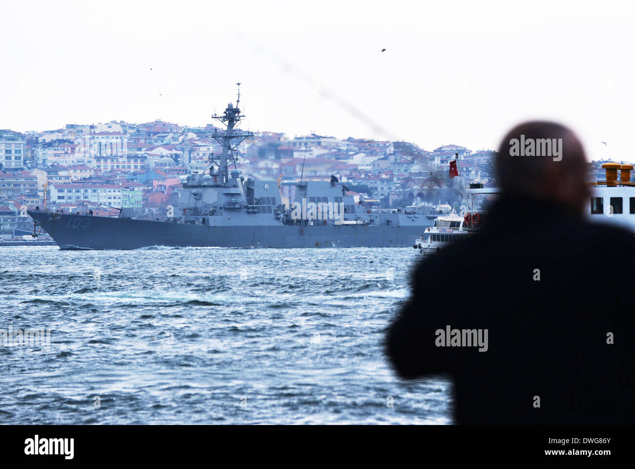 Istanbul, Turkey. 7th Mar, 2014. The U.S. guided-missile destroyer USS Truxtun is seen passing through the Bosphorus strait in Istanbul, Turkey, March 7, 2014. A U.S. guided-missile destroyer USS Truxtun is passing through the Bosphorus strait in Istanbul on Friday afternoon on its way to Black Sea. It will participate in a tactical drill in the northwestern part of the Black Sea on March 11, along with one frigate from Bulgaria and three ships from Romania. Credit:  Lu Zhe/Xinhua/Alamy Live News Stock Photo