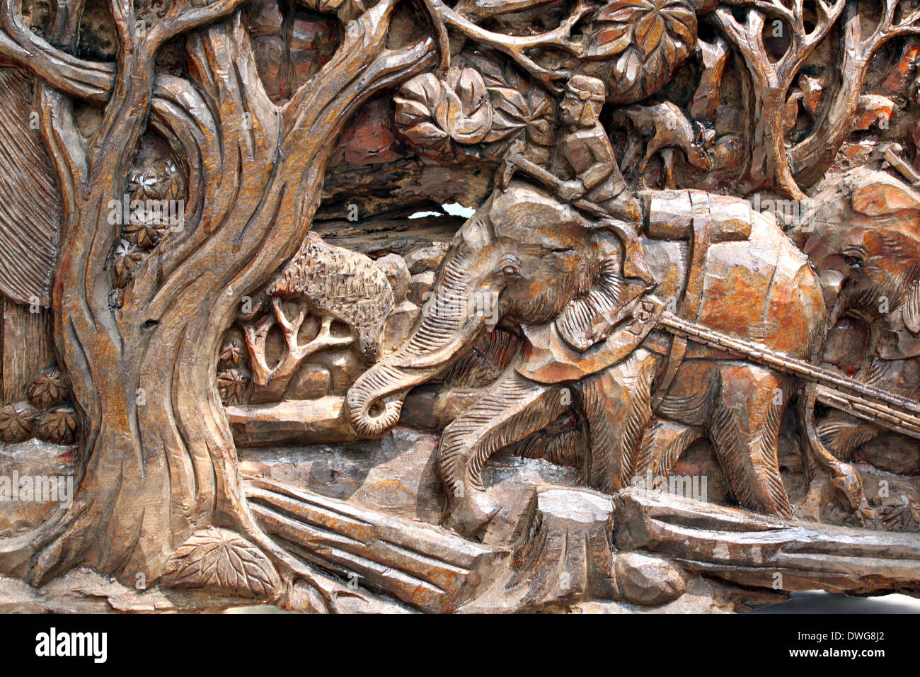 Motifs carved from wood of elephant. Stock Photo