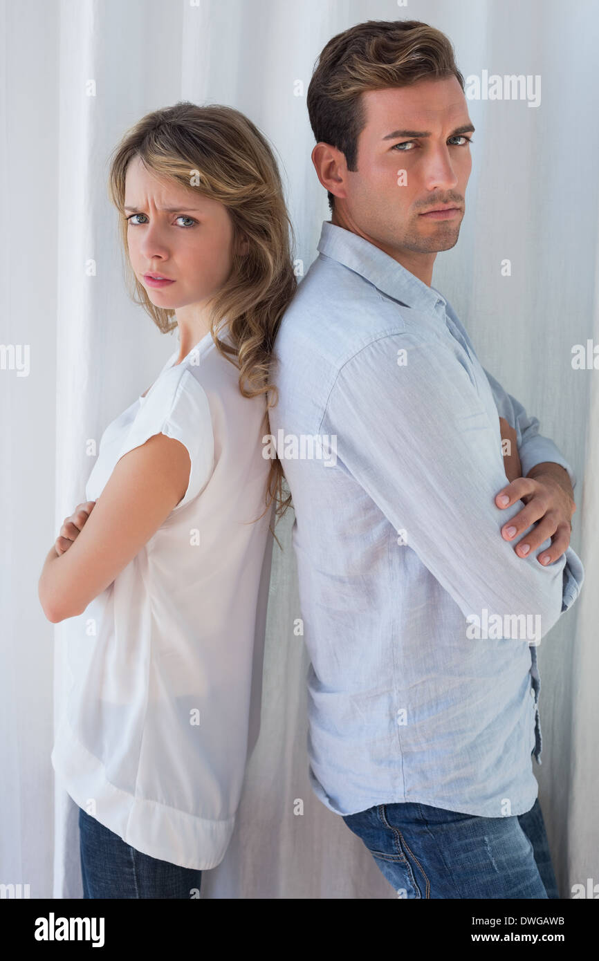 Portrait unhappy adult couple standing hi-res stock photography and ...