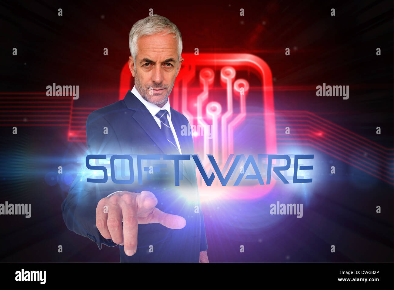 Software against shiny red circuit board on black background Stock Photo