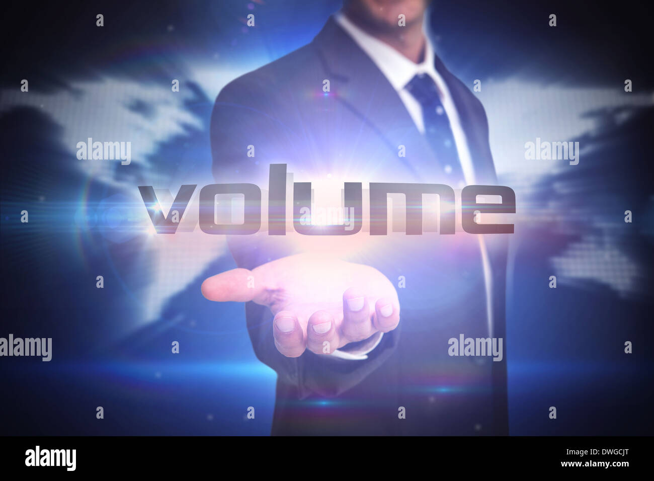 Volume against glowing world map on black background Stock Photo