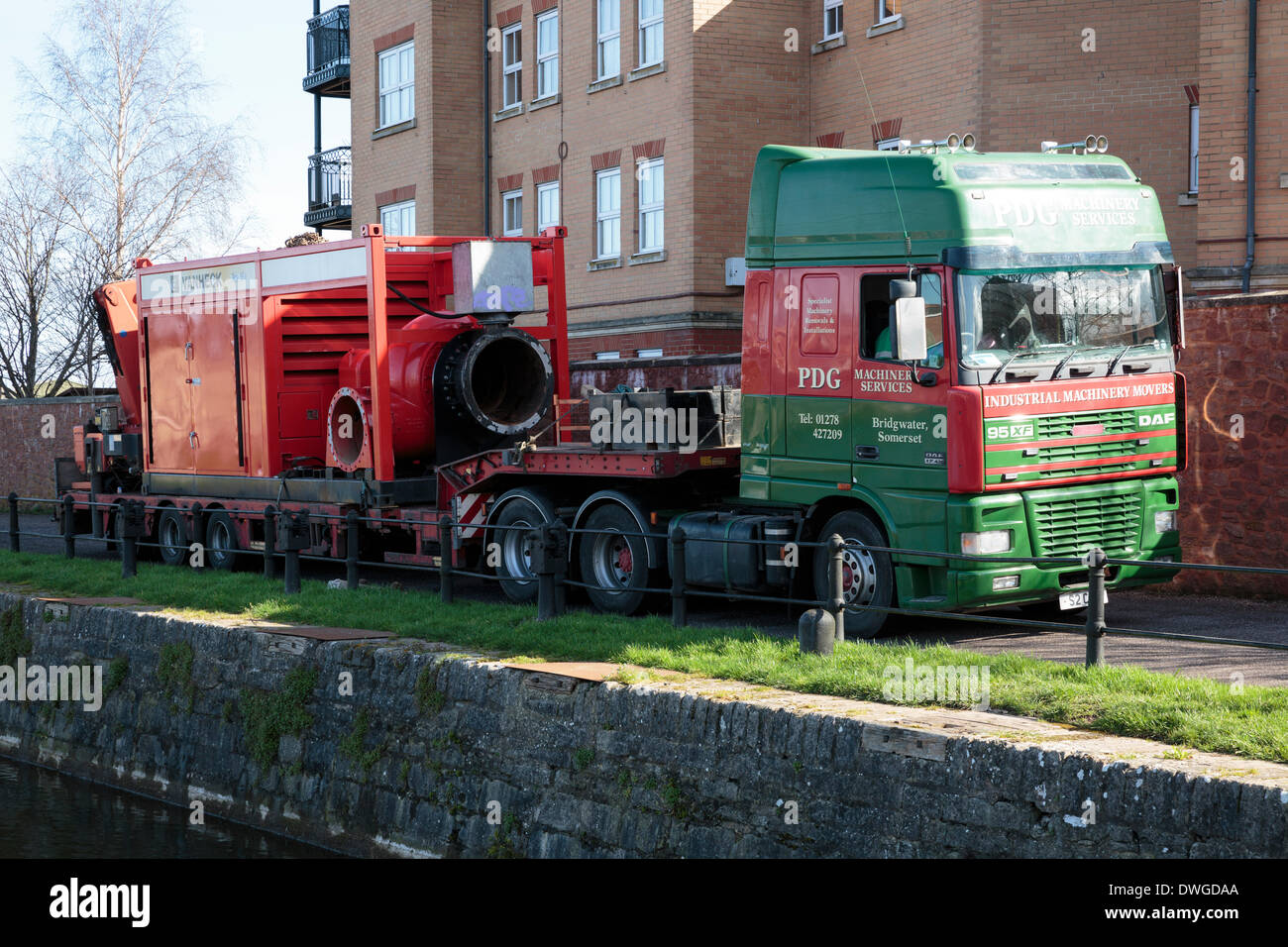 Bridgwater Docks, Somerset, UK . 07th Mar, 2014. Dutch Vanheck pump loaded onto a waiting lorry for its return trip back to Holland on Friday 7th March, 2014 at Bridgwater Docks. The high capacity pump was installed by the Environment Agency in mid February as a precaution to pump water back into the River Parrett to prevent the Bridgwater canal from overtopping. This follows the worst floods on the Somerset Levels in living history. Credit:  Nick Cable/Alamy Live News Stock Photo