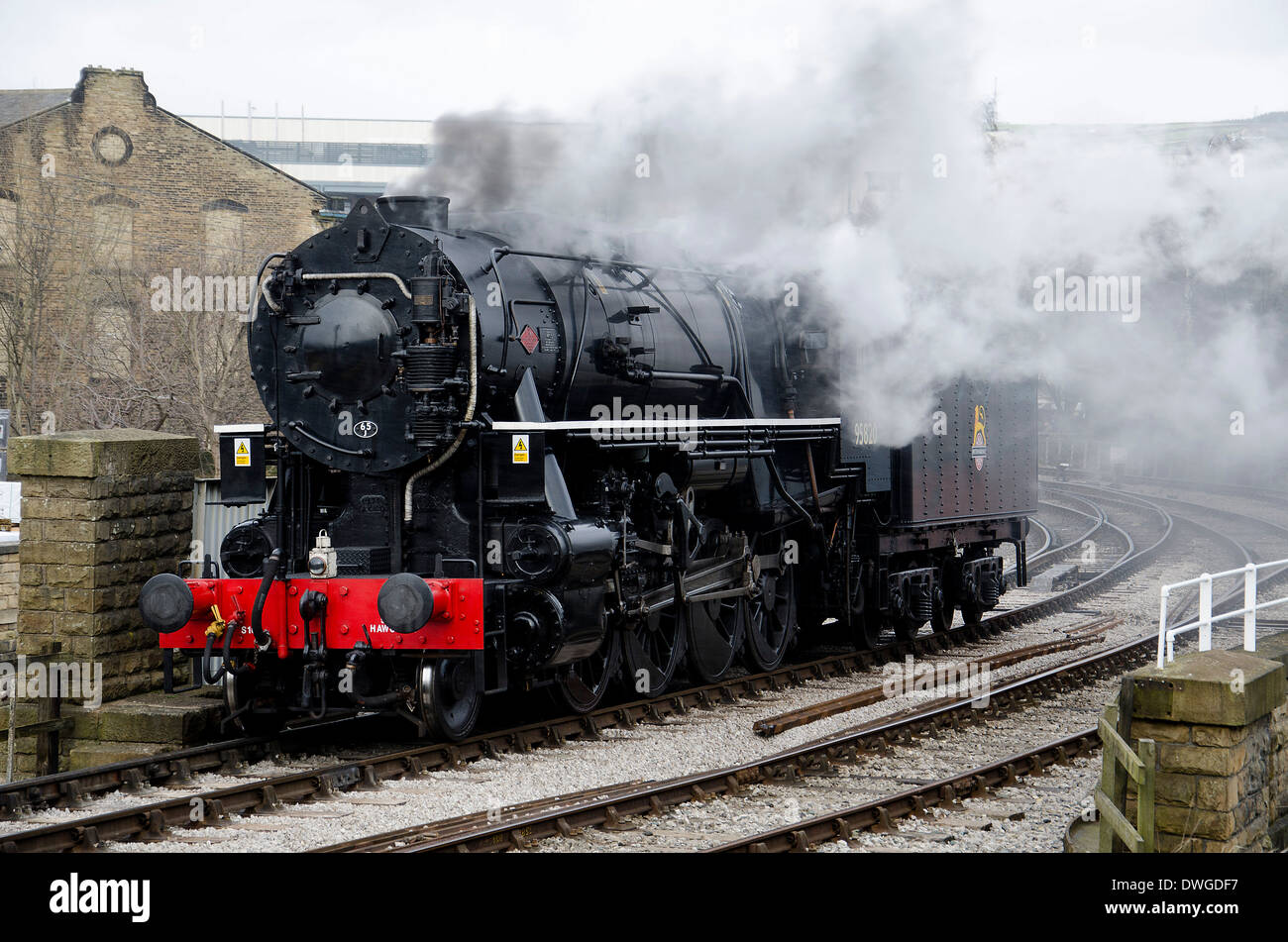 Steam Train departing with passenger service on heritage line Stock Photo