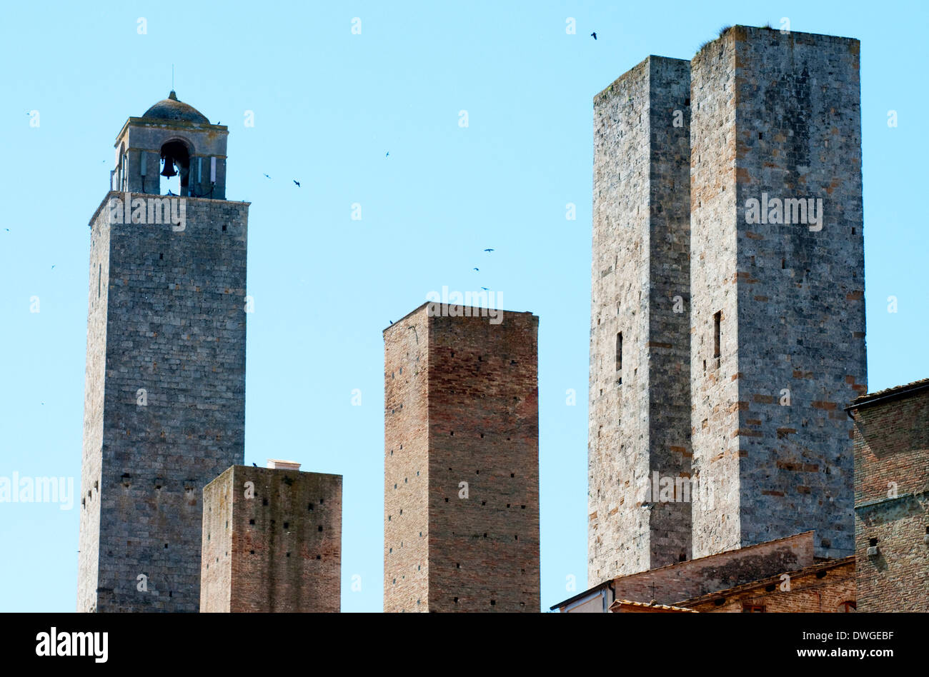 The Tower Houses of the medieval walled hill town of San Gimignano, Siena, Tuscany, Italy, Europe Stock Photo
