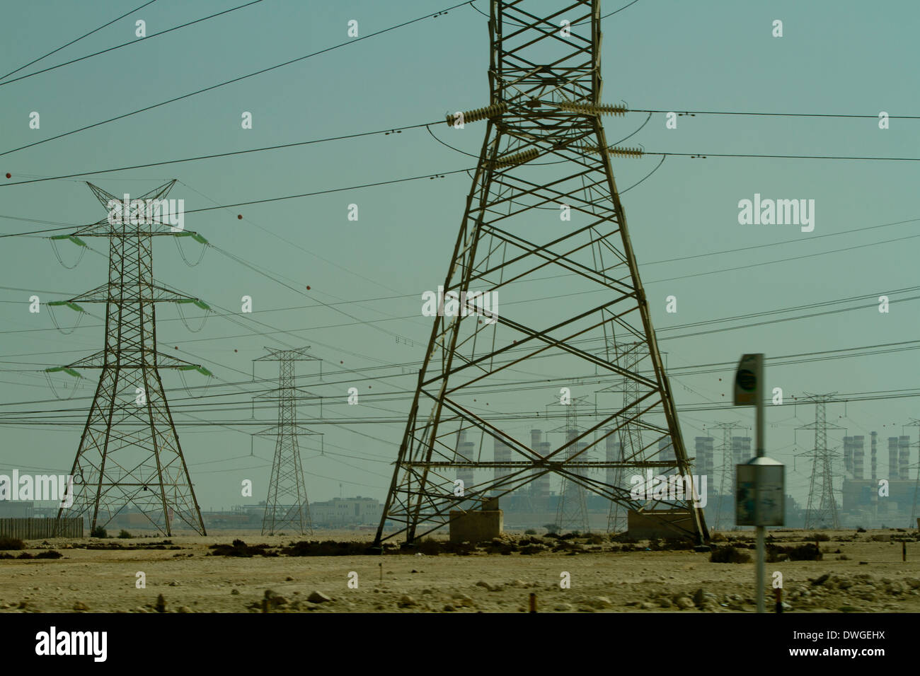 Electricity Pylons in desert Qatar Middle East Stock Photo