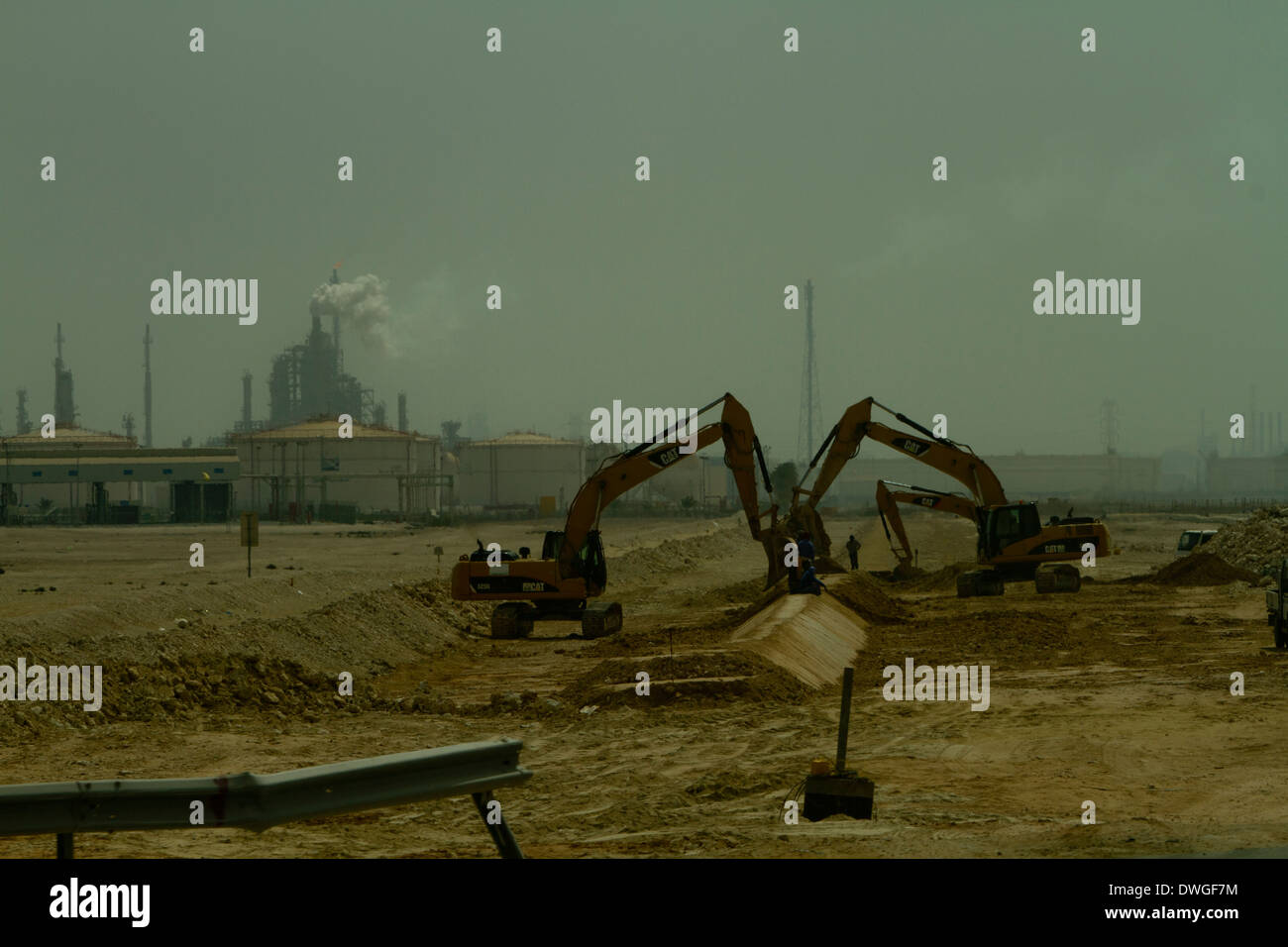 Qatar Construction building site diggers Desert Factory Stock Photo