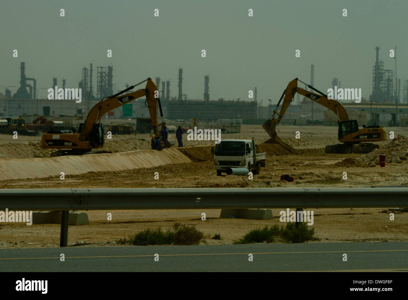 Qatar Construction building site diggers Desert Factory Stock Photo