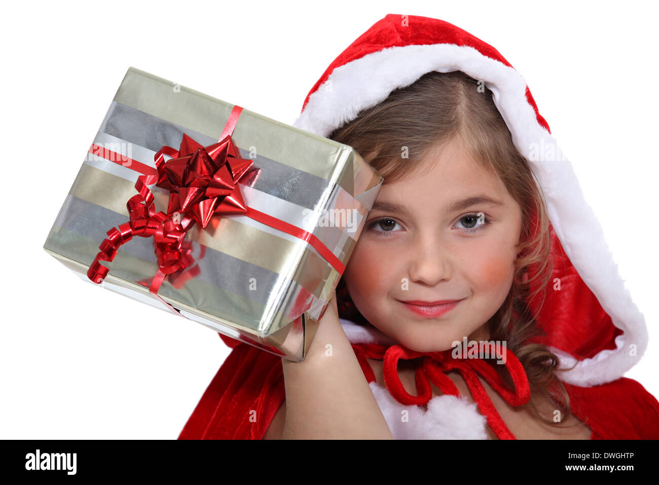 little girl dressed as a Santa Claus holding a present Stock Photo - Alamy