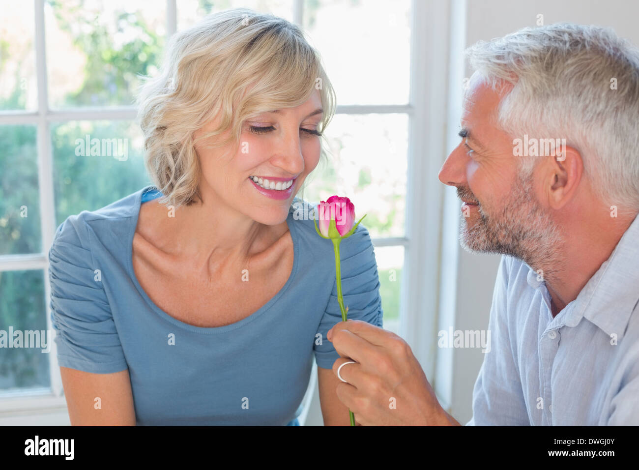 Happy mature couple flower hi-res stock photography and images - Alamy