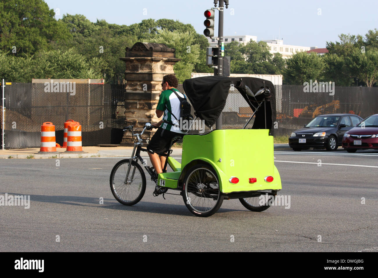 Man riding tricycle on the street in Washington DC Stock Photo Alamy