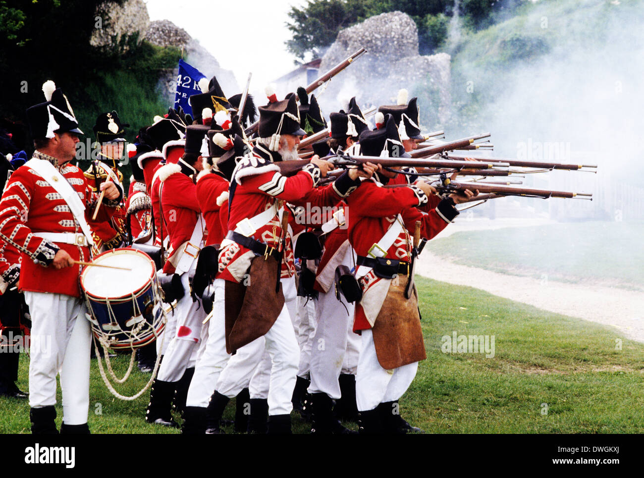 British soldiers, musket volley, 1815, as deployed at Battle of Waterloo, historical re-enactment, 42nd Regiment of Foot soldier musket muskets firing Army uniform uniforms Stock Photo