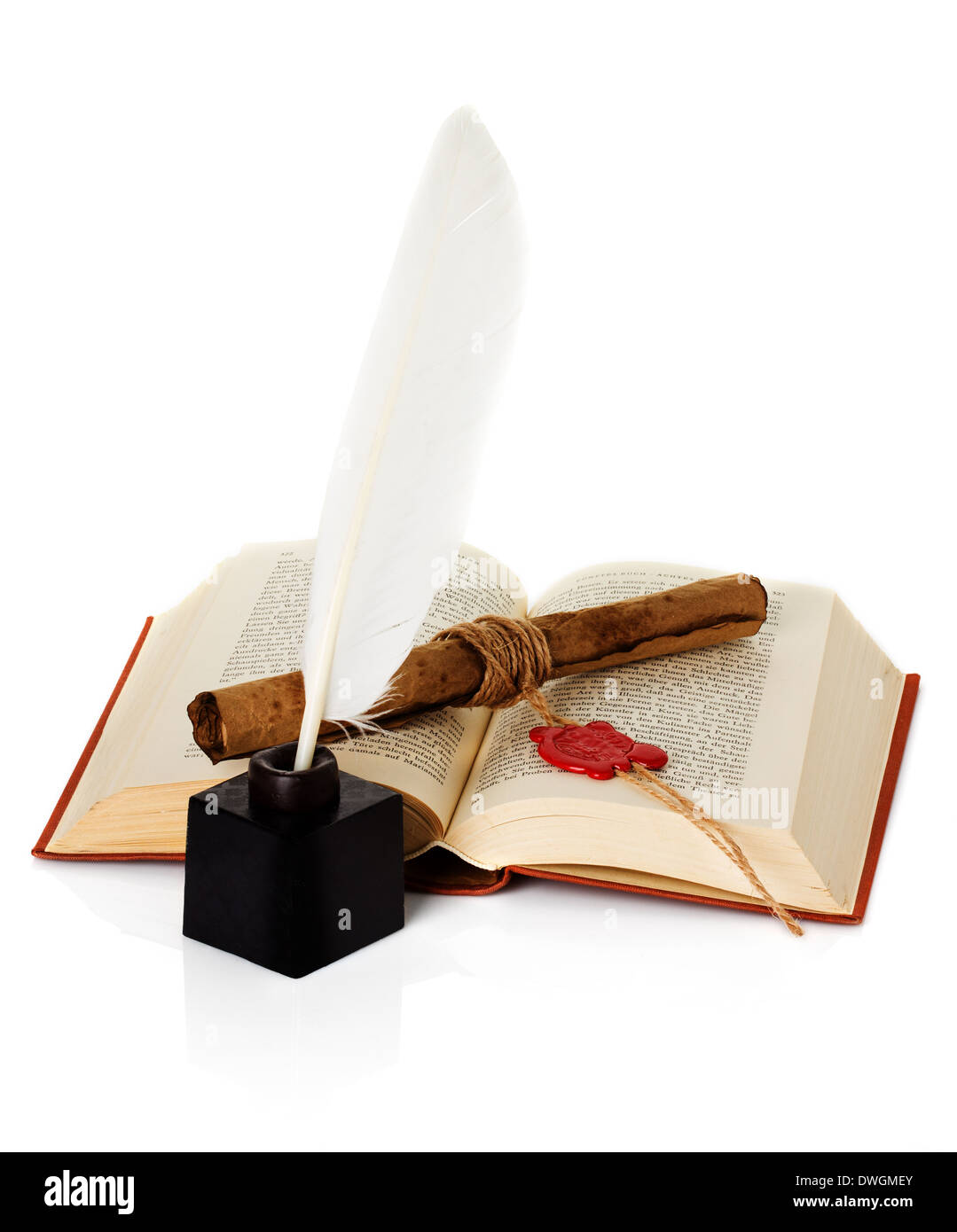 old book with inkwell, quill pen and scroll Stock Photo