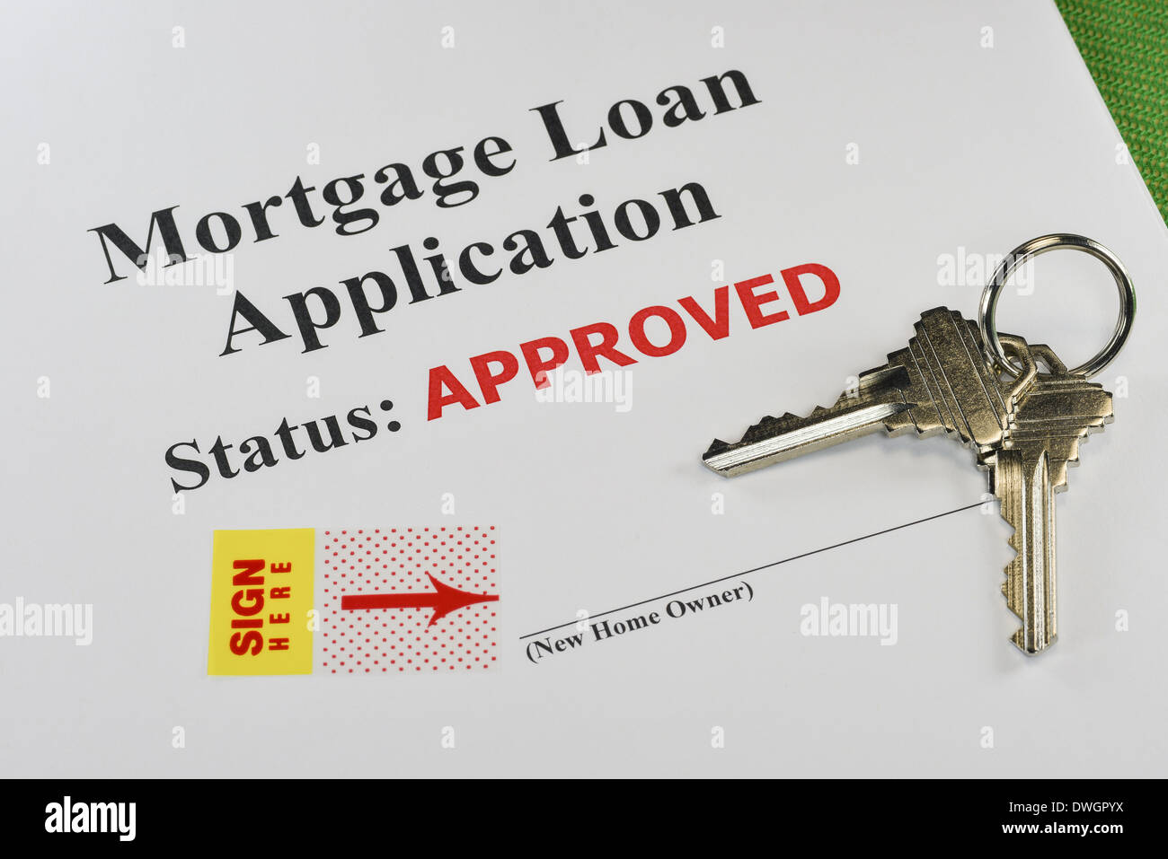 Approved Real Estate Mortgage Loan Document Ready For Signature With House Keys Stock Photo