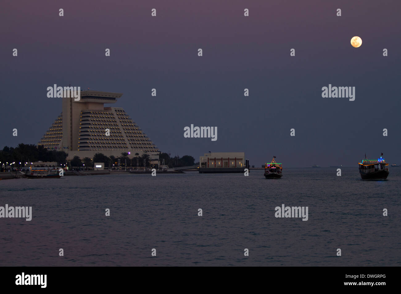 Qatar Doha Sea front City Moon Traditional boats Stock Photo