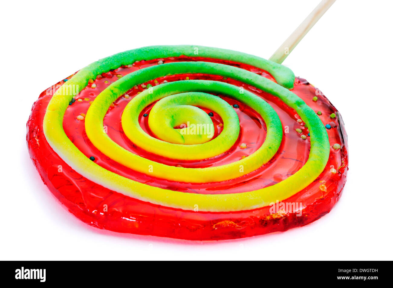 a colorful lollipop with a spiral pattern on a white background Stock Photo