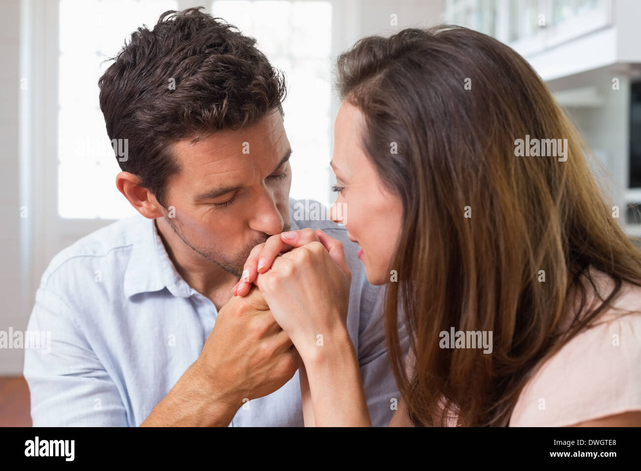 Man kissing womans hands hi-res stock photography and images - Alamy