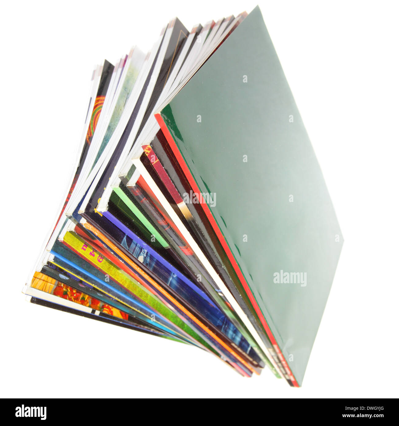 Pile of colorful magazines isolated over white background Stock Photo