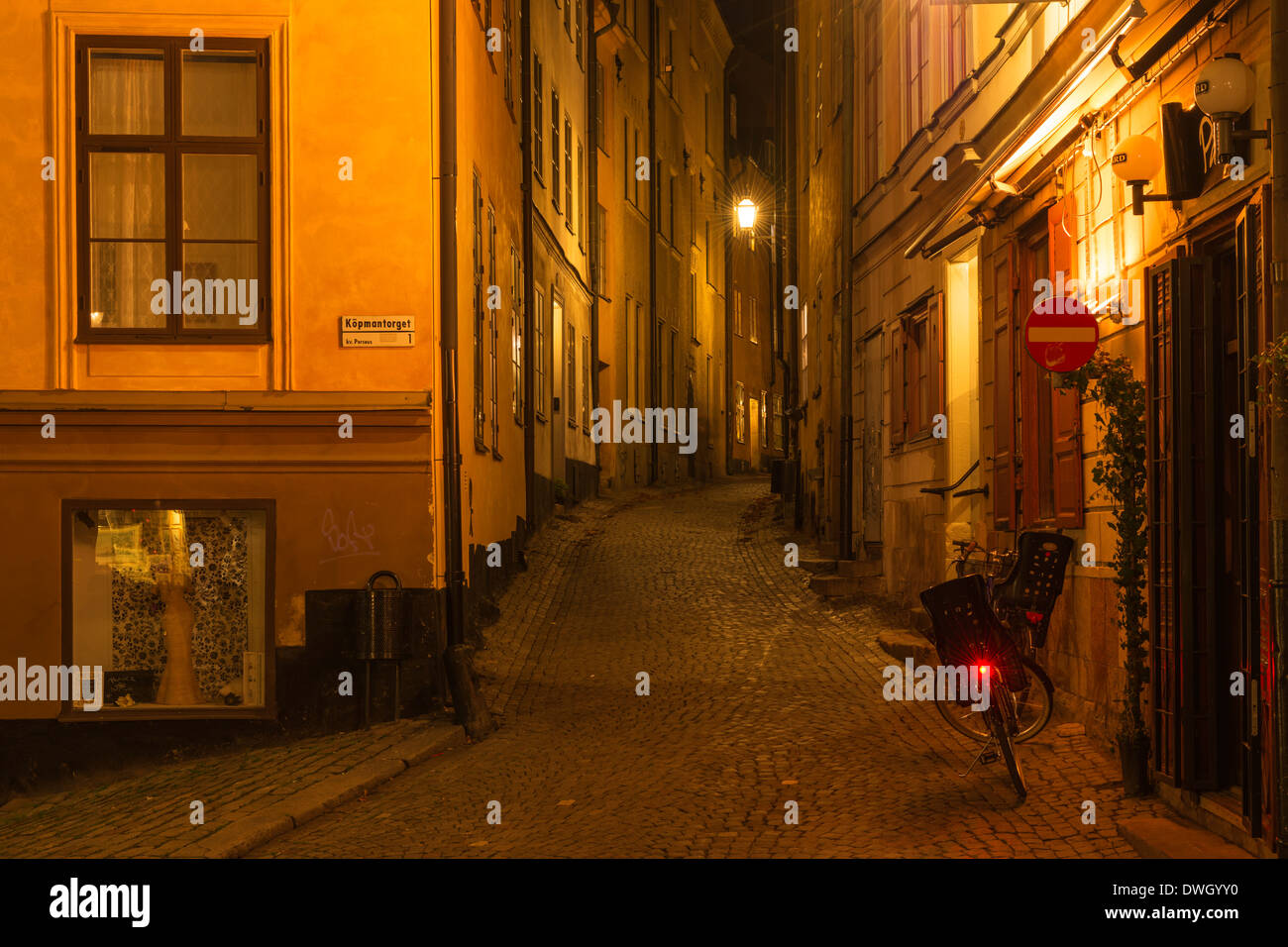 Evening view of Baggensgatan, a narrow cobbled lane in Gamla Stan, the old town of Stockholm, Sweden. Stock Photo
