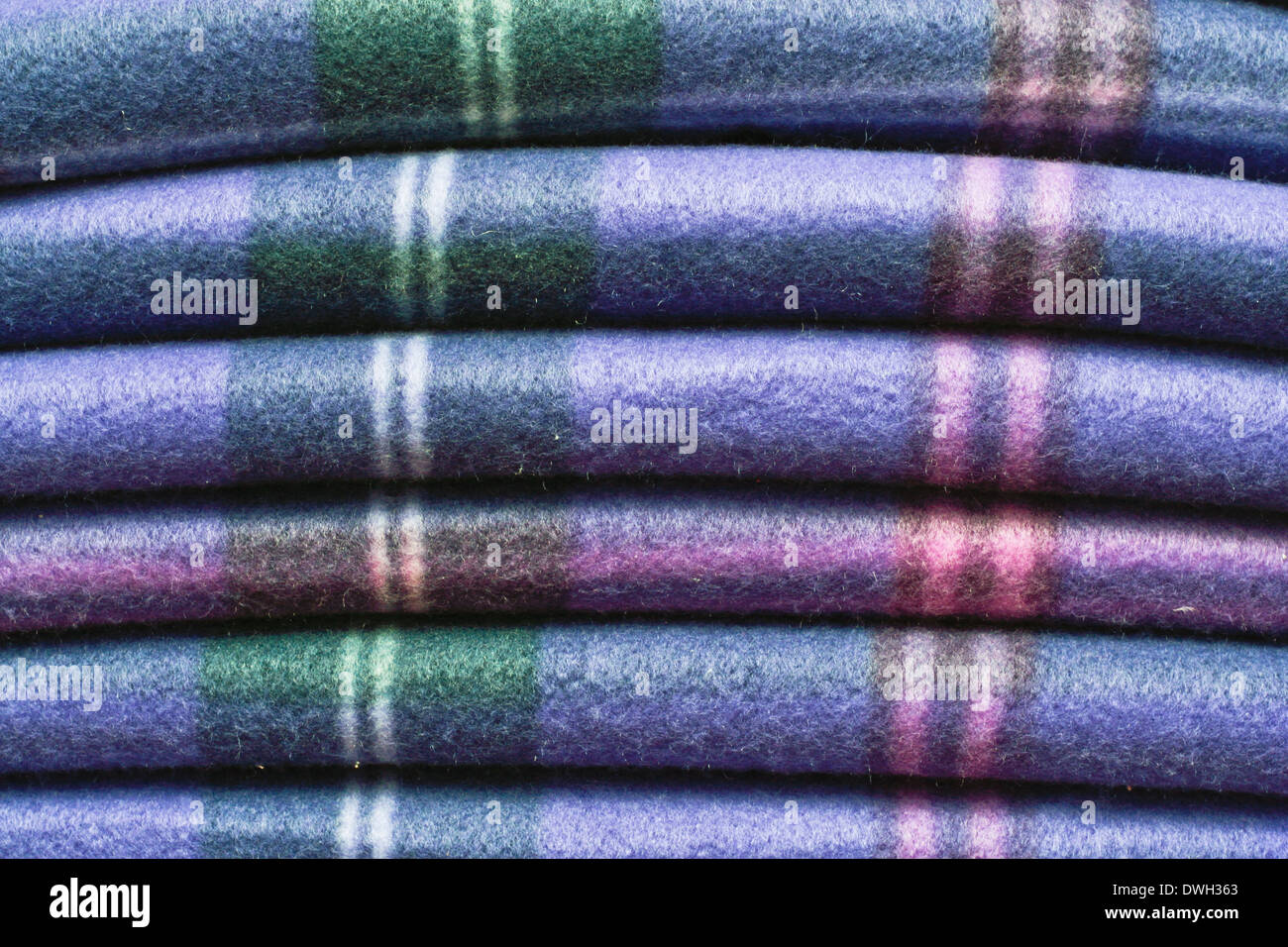 Folded tartan blanket as a background image Stock Photo