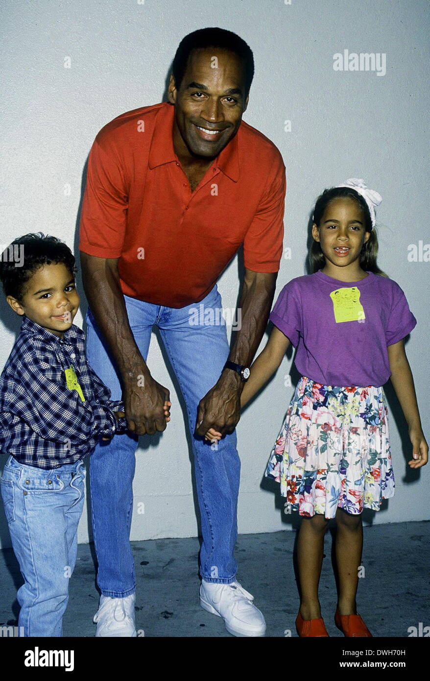 Feb 3, 1994 - Los Angeles, California, U.S. - O.J. SIMPSON with Children JUSTIN RYAN SIMPSON and SYDNEY BROOKE SIMPSON. Wife Nicole Brown and her friend R. Goldman were murdered on June 12, 1994 and OJ Simpson was charged with their deaths and subsequently acquitted of all criminal charges in a controversial criminal trial. In the unanimous jury findings of a civil court case in February 1997, Simpson was found liable for the wrongful death of Goldman and stabbing of Brown. PICTURED: Exact Date Unknown c. early 1994. (Credit Image: © Castilla/Globe Photos/ZUMAPRESS.com) Stock Photo
