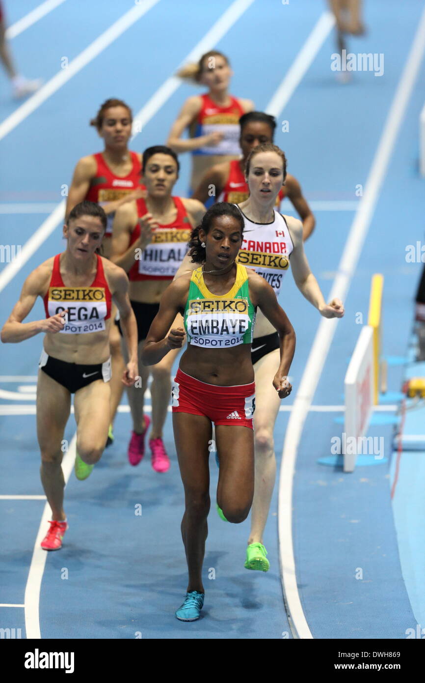 Sopot, Poland 8th, March 2014 IAAF World Indoor Championships in Sopot.  Abeba Aregawi (Sweden) wins 1500 Metres final. Luiza Gega (Albania) (L) and Axumawit Embaye (Ethiopia) (R) competite during the run. Stock Photo