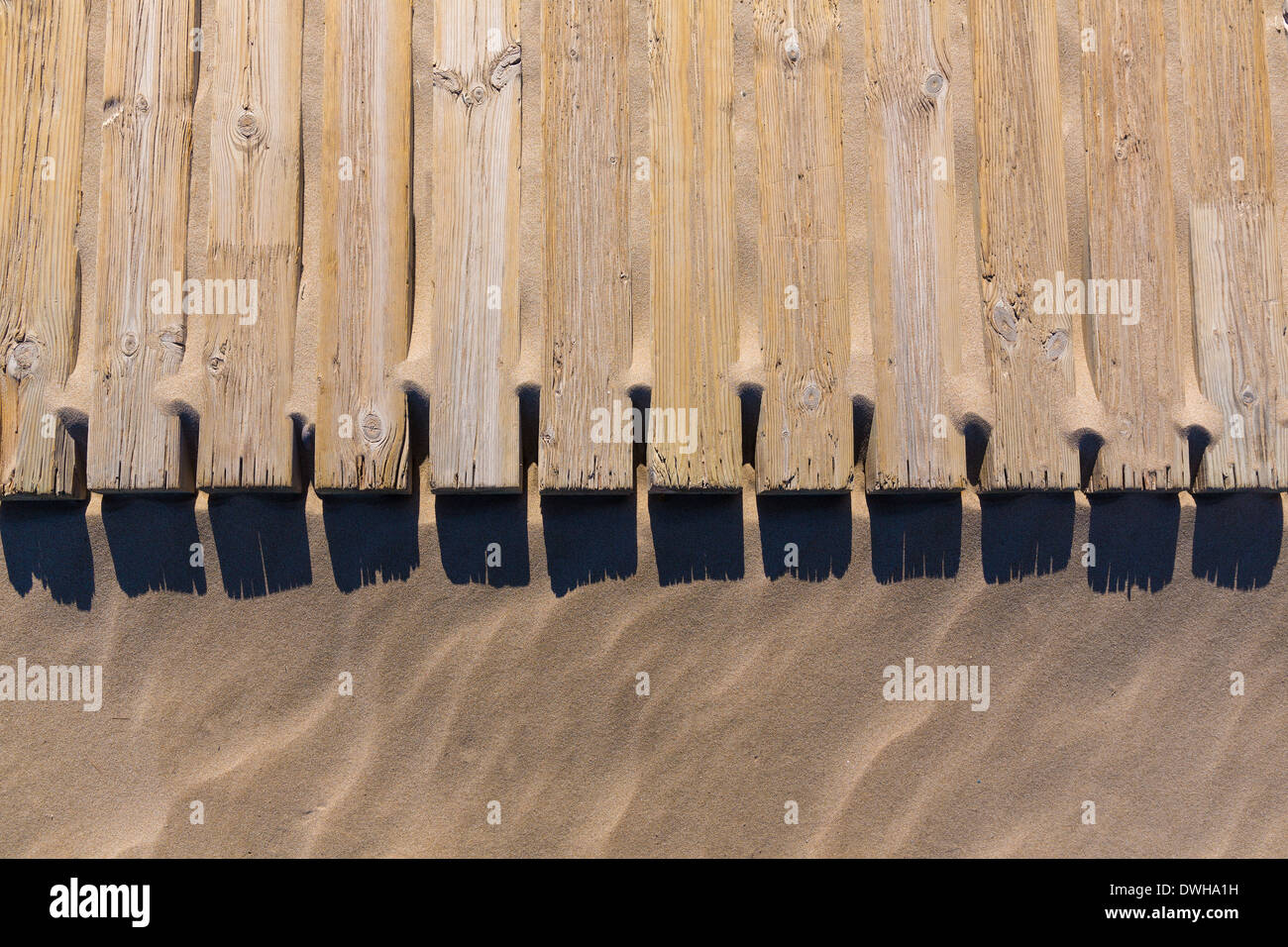 pine wood deck weathered in beach sand pattern texture detail Stock Photo
